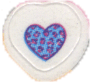 scan of a Lisa Frank sticker with a blue and purple leopard print heart